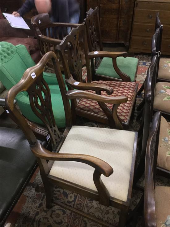 Two Chippendale style mahogany elbow chairs and a single chair